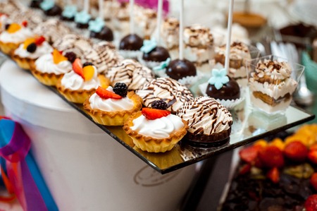 Delicious wedding reception candy bar dessert tableの写真素材