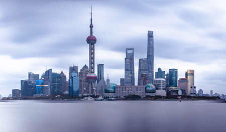 Shanghai Pudong landmark skyline in cloudy weather China. Shanghai has been developed specifically as a new financial district of China.のeditorial素材