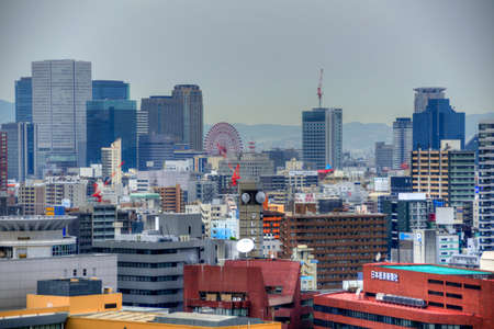 Ariel view of Osaka during daytime. Osaka is a large port city and commercial center on the Japanese island of Honshuのeditorial素材