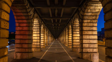 Bicycle lane on Pont de Bercy famous bridge across Seine river, travel to Franceのeditorial素材
