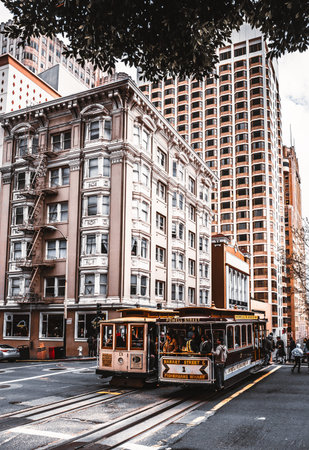 Classic view of historic San Francisco Cable Cars on famous Pine Street.