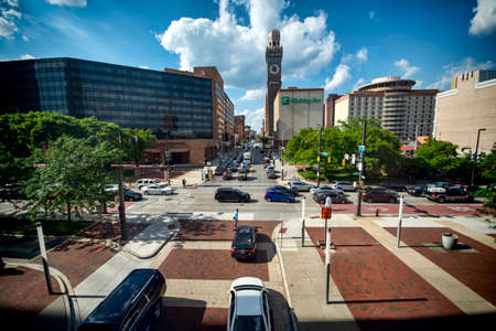 People drive in downtown Baltimore. Baltimore is the largest city in the state of Maryland.のeditorial素材