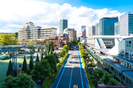 Top of modern buildings in Tokyo, Japan. Tokyo is the seat of the Emperor of Japan and the Japanese government.のeditorial素材