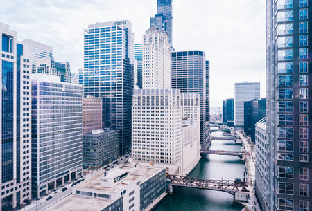 aerial view of skyline along Chicago river through downtown