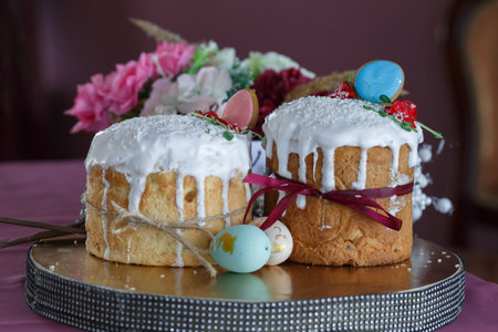 two Easter cakes and colored eggs. High quality photo