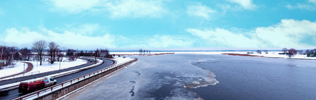 Roads and river in winter, Latvia. Winter panoramic landscapeの写真素材