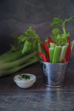 Assorted fresh vegetables with sauce, selective focusの写真素材