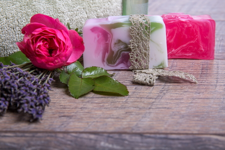 Handmade Soap with bath and spa accessories. Dried lavender and nostalgic pink roseの写真素材