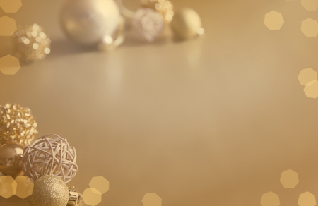 Gold Festive Christmas background. Christmas ball golden decoration.の写真素材