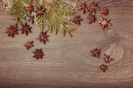Christmas composition. Spruce branches, xmas tree, xmas pink decor holiday ball with ribbon on white background.