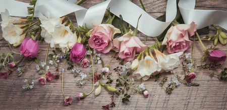 Creative pattern, floral frame made of colorful spring flowers anemones, roses, daisy with copy space. Minimal style. Flat lay. Mother's, Valentines, Women's, Wedding Day concept.の写真素材