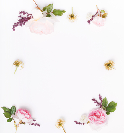 Festive flower composition on the white wooden background. Overhead viewの写真素材