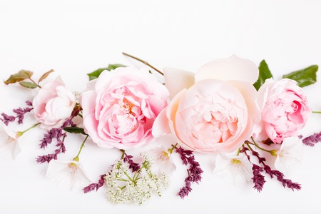 Festive flower composition on the white wooden background. Overhead viewの写真素材