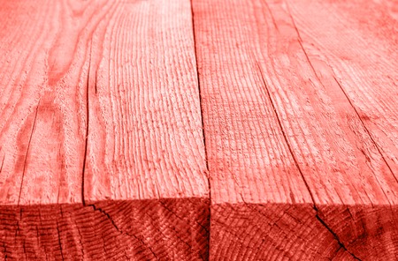 Rough wooden boards, background toning in Living Coral color of the Year 2019の写真素材