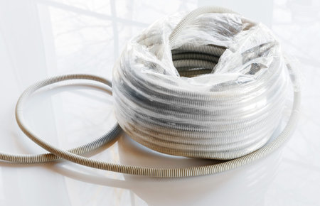 Corrugated gray plastic pipes used for electrical lines