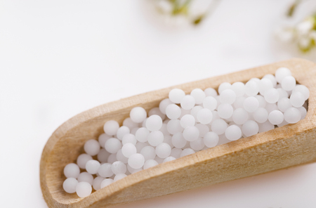 Homeopathy - A homeopathy concept with homeopathic medicineの写真素材