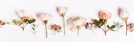 Festive flower composition on the white wooden background. Overhead viewの写真素材