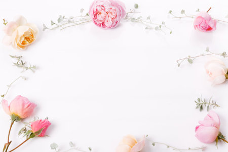 Festive flower English rose composition on the white background. Overhead top view, flat lay. Copy...