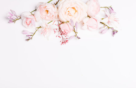 Festive flower composition on the white background. Overhead view