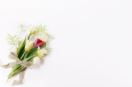 Spring bouquet of small flowers tulip, floral arrangement on white background.