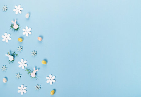 Festive Easter border, frame from easter eggs and spring flower crocus on blue background.