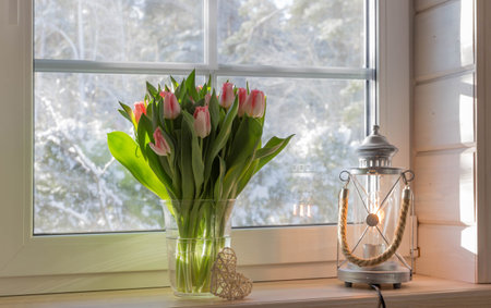 Bouquet of beautiful pink tulips on a wooden windowsill. Spring concept, Happy 8 March, Womens Day