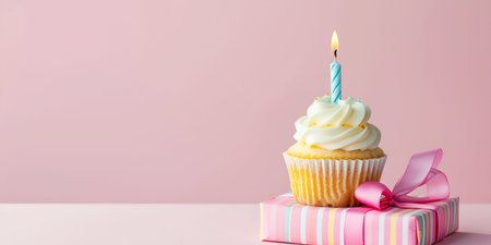 Birthday Cupcake with birthday candle with copy spaceの素材