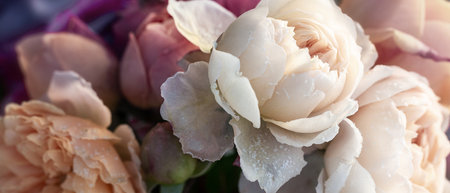 Frosted roses bouquet in vase, pastel tones, autumn winter floral arrangement, seasonal decoration, nature background, holiday design element, copy space, frosty petals, romantic still lifeの写真素材