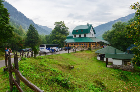 KOLASIN, MONTENEGRO - SEPTEMBER 20, 2015: Unidentified tourists visit the restaurant during a sightseeing trip in Kolasin, Montenegroのeditorial素材