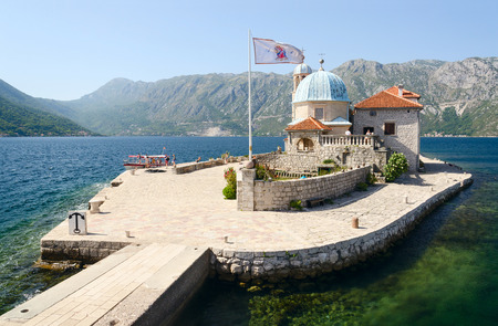 PERAST, MONTENEGRO - SEPTEMBER 16, 2015: Unknown tourists visit the Island of Our Lady on the Reef near the resort town Perast in the Bay of Kotor, Montenegroのeditorial素材