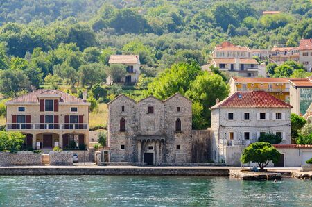 PRCANJ, MONTENEGRO - SEPTEMBER 16, 2015: House "Three Sisters" (Tre Sorelle) in Prcanj, Kotor Bay, Montenegro. Monument of architecture of XV centuryのeditorial素材