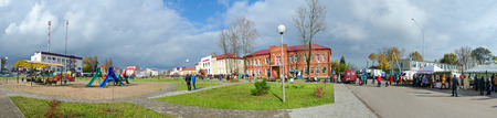 SENNO, BELARUS - OCTOBER 8, 2016: Panoramic view of central town square, Senno, Vitebsk region, Belarus. Unidentified people walk outdoors during event Dozhinki-2016のeditorial素材