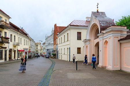 VILNIUS, LITHUANIA - JULY 10, 2015: Unidentified people are on Street Ausros Vartai near entrance to Holy Spirit Monastery in Old Town, Vilnius, Lithuaniaのeditorial素材