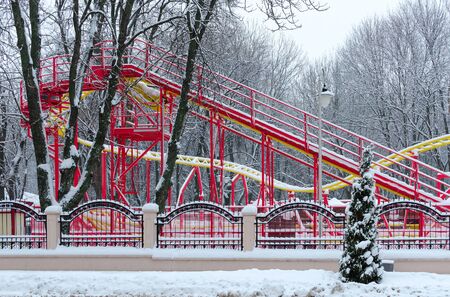 GOMEL, BELARUS - JANUARY 12, 2017: Snowy attraction "Funny roller coaster" in winter park during snowfall, Gomel, Belarusのeditorial素材