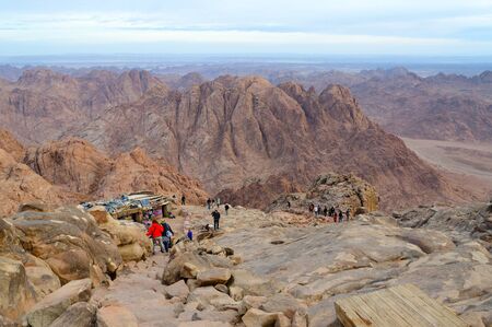 SINAI, EGYPT - NOVEMBER 28, 2013: Unidentified tourists descend on long path from top of Mount Moses, Egyptのeditorial素材
