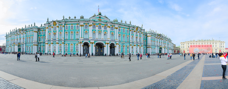 SAINT PETERSBURG, RUSSIA - MAY 1, 2017: Unknown tourists walk along Palace Square near State Hermitage Museum (Winter Palace), St. Petersburg, Russiaのeditorial素材