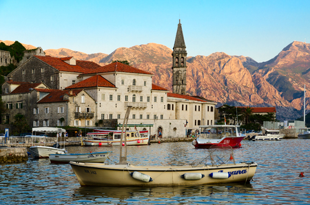 PERAST, MONTENEGRO - SEPTEMBER 13, 2017: Unknown people walk along promenade of small popular resort town of Perast, Montenegroのeditorial素材