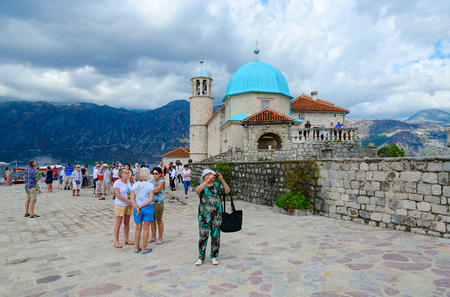PERAST, MONTENEGRO - SEPTEMBER 10, 2017: Unknown tourists visit Island of Virgin on reef (Gospa od Skrpela Island), Montenegroのeditorial素材