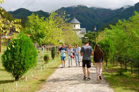 MONASTERY OF MORACA, MONTENEGRO - SEPTEMBER 12, 2017: Unknown tourists go to famous monastery of Moraca, Montenegroのeditorial素材