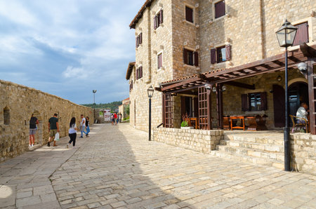 ULCINJ, MONTENEGRO - SEPTEMBER 9, 2017: Unidentified tourists are strolling in Old Town, Ulcinj, Montenegroのeditorial素材