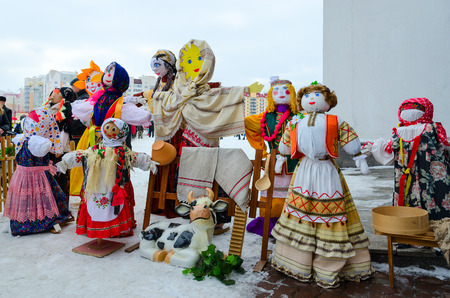 GOMEL, BELARUS - FEBRUARY 18, 2018: Shrovetide dolls at Shrovetide festivities outdoors, Gomel, Belarusのeditorial素材