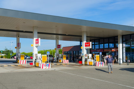 FRANCE - SEPTEMBER 8, 2018: Unknown people are at petrol station with shop, restaurant in France