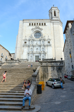 GIRONA, SPAIN - SEPTEMBER 11, 2018: Unknown people are on Cathedral Square near Cathedral in historic center of city, Girona, Spainのeditorial素材