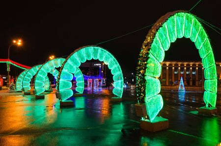 GOMEL, BELARUS - JANUARY 8, 2019: Festive Christmas illumination on Lenin Square, evening view, Gomel, Belarusのeditorial素材