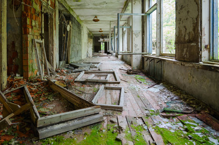 Corridor of abandoned school in resettled village of Pogonnoe in exclusion zone of Chernobyl nuclear...