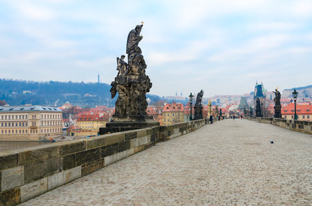PRAGUE, CZECH REPUBLIC - JANUARY 22, 2019: Sculptural compositions of Charles Bridge, Prague, Czech Republic. Saint Francis Xavier, missionary of Catholic Church, co-founder of Jesuit order (1711)のeditorial素材