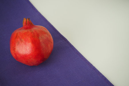 Ripe pomegranate. Round fruit of gracial color.の写真素材