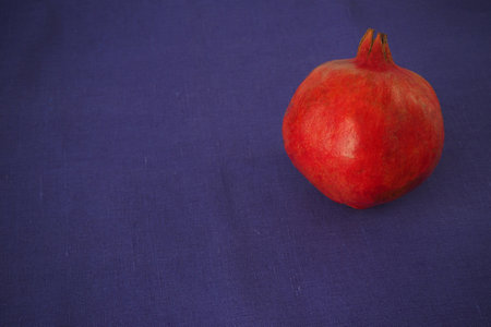 Ripe pomegranate. Round fruit of gracial color.の写真素材