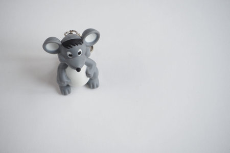 Childrens toy mouse on a white background. Symbol of the year.