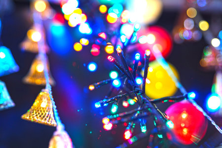 Christmas background, bokeh. Colorful shining garlands as a Christmas background.